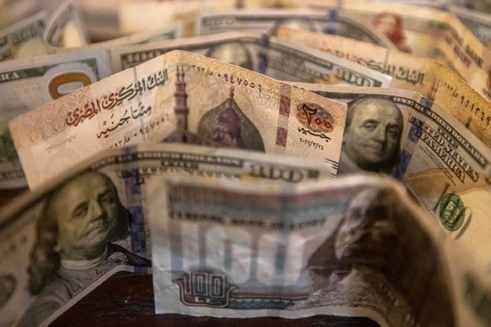 اسباب تراجع سعر الدولار مقابل الجنيه في مصر 