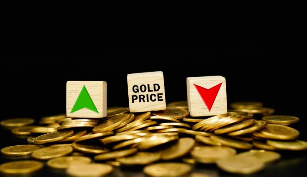 الذهب يتراجع مع صعود الدولار وآمال خفض الفائدة