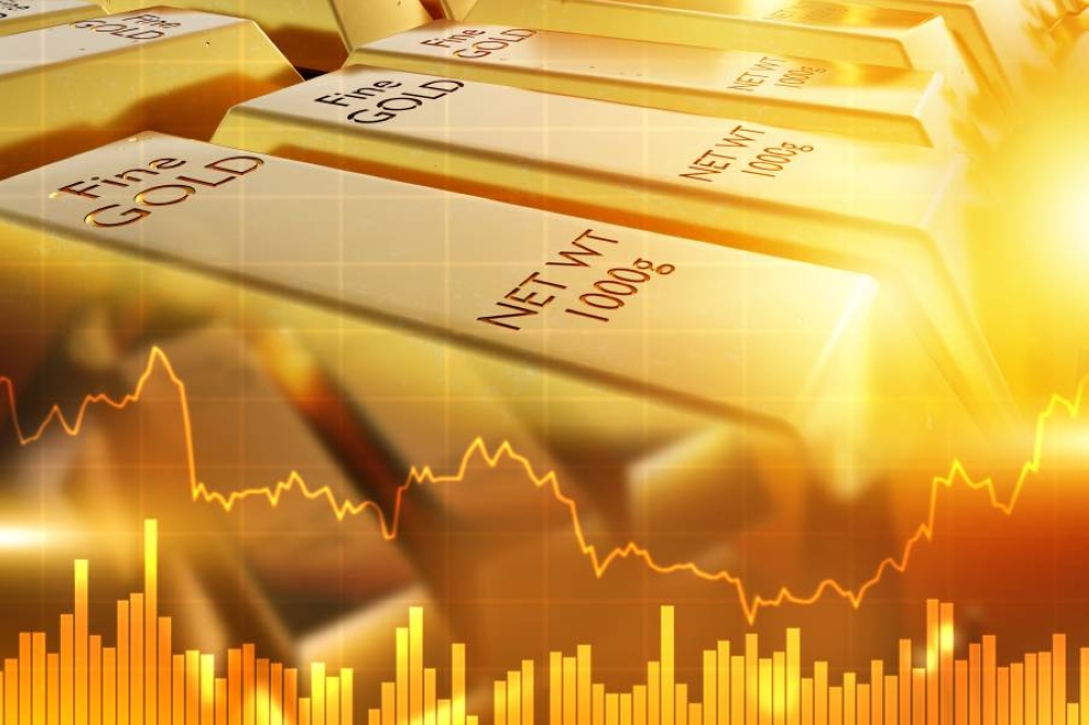 رهانات خفض الفائدة تدفع الذهب إلى أعلى مستوى