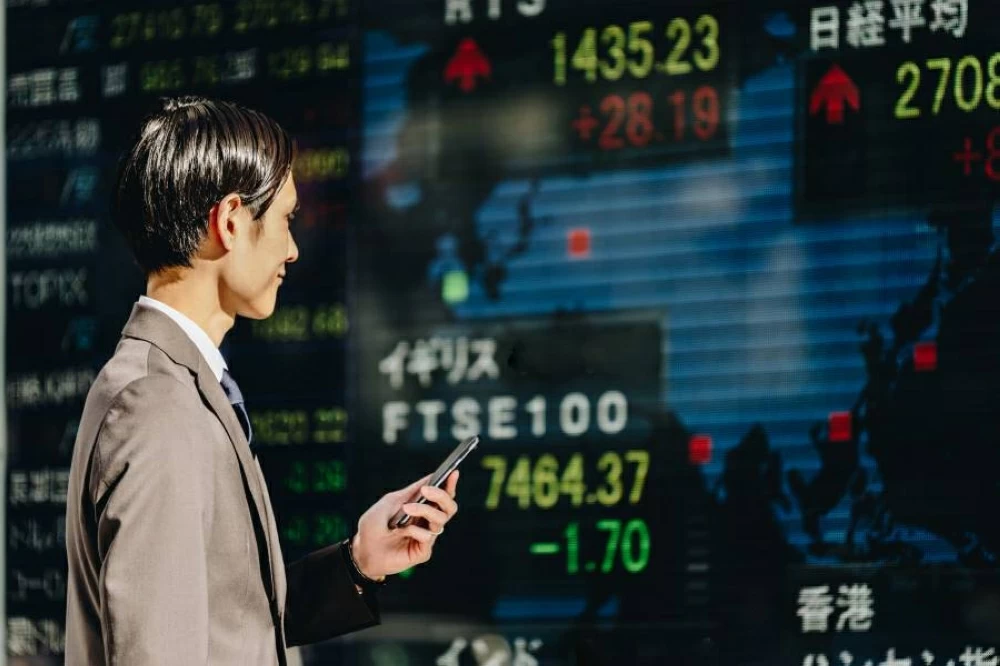الأسهم الآسيوية تستقر قبل نتائج إنفيديا وسط توتر حول استقلالية الفيدرالي 